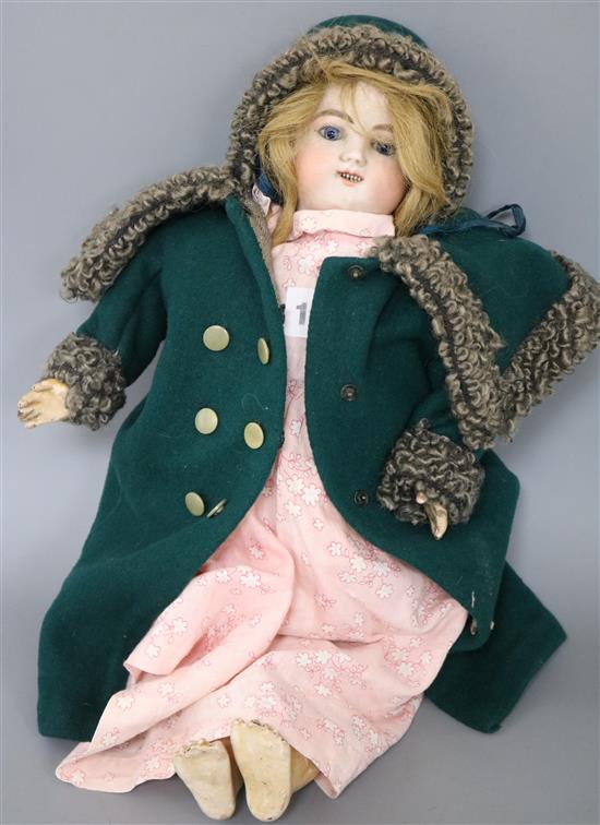 An automaton bisque head doll